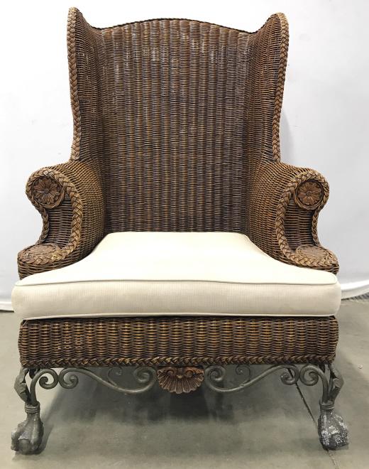 Wicker Wingback Armchair With Ball & Claw Feet: Wicker Wingback Armchair With floral and braid design, cream toned cushion, metal S Scroll Skirt And Metal Ball & Claw Footed Feet. Marks to Upholstered cushion and slight wear to wicker finish, measu