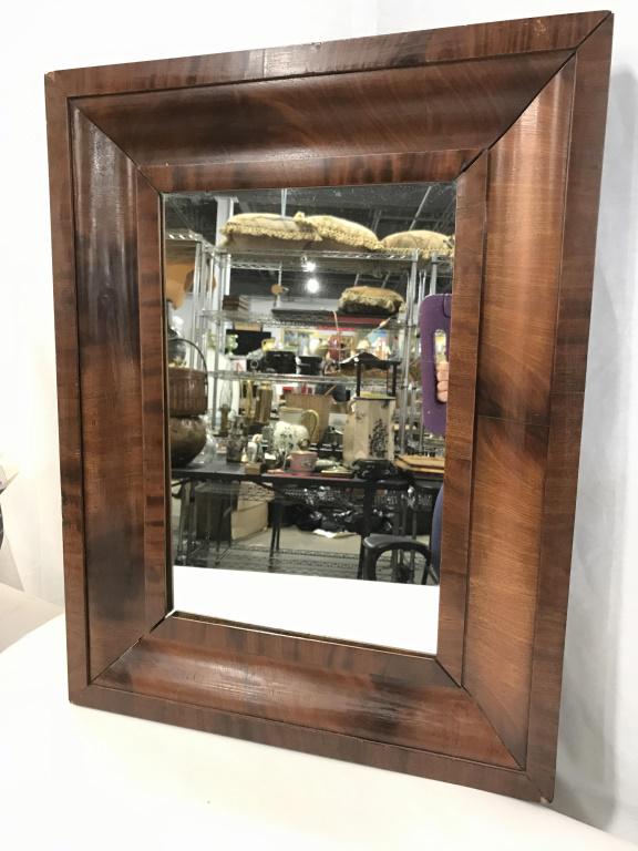 Antique BURLED Mahogany Wood Mirror: Antique 26.5 x 20.5 x 1 in. Mahogany wood frame. Hand crafted with antique nails. Smoothed wood surface, light scratch on bottom. Use of long thin nails to secure wood backing. Corners may need some r