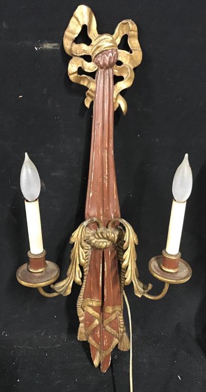 Pair antique hand carved wall sconces: Pair of antique, wood candelabra, wall sconces carved as ribbon jabot tassels. Each Icanthus leave sconce has two scrolled arms, each has been electrified. Possible French antique. The pieces measure