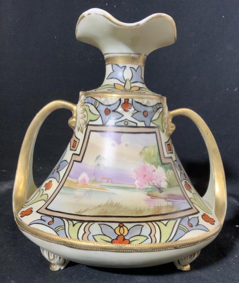 Nippon Hand Painted Double Handled Vase: Footed porcelain vase, hand painted river scene and geometric, shelf piece, home accent, gold accents, measures ht app 9.5 inches, diameter app 8.5 inches, collectible Nippon porcelain