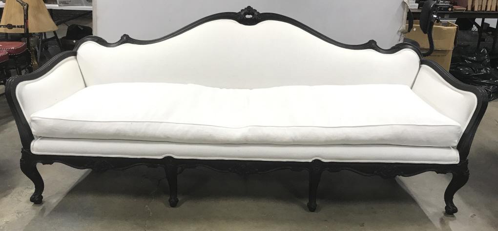Meyer Gunther Martini Louis XV Style Sofa: Vintage Meyer Gunther Martini Louis XV Style Sofa with black toned painted carved scroll and acanthus leaf design, upholstered in custom white fabric with double welted trim, marked under cushion with