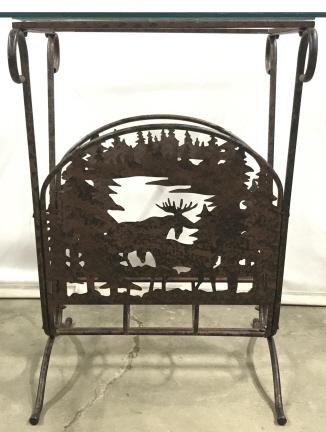 Adirondack Themed Glass Topped Iron Side Table: Adirondack Themed Glass Topped Iron Side Table magazine rack, lower portion of table has a laser cut Adirondack scene depicting A moose walking through the forest, measures approximately 22 inches tal