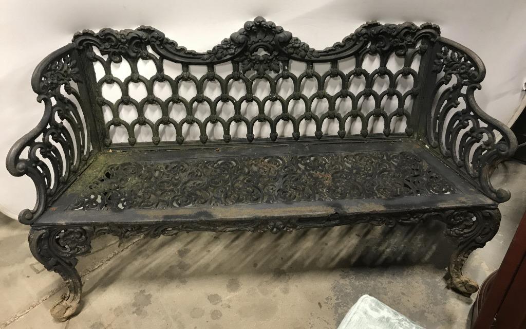 Black Toned Antique Outdoor Iron Bench: Bench has ornate c & s scroll, floral & leaf detail. Bench is footed. Piece is vintage possibly antique. Measures approx. 60 inches long 36 inches tall 18 inches deep. outdoor bench, metal bench, outd