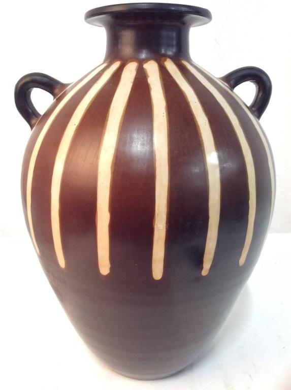 JOSE SOSA Ceramic Vase W Handles: Vase is chocolate toned & ceramic. Contains cream toned detail on top half. Piece measures approx 13 inches tall 9 inches wide. Underside is signed JOSE SOSA. Made in Peru. vase, vessel, decorative ac