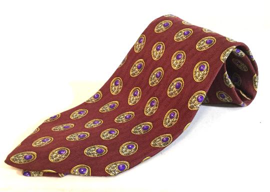 VALENTINO Cravatte Italian Silk Tie: Vintage Luxe Italian Designer Shirt Tie. Burgundy with oval repeat design. 100 % Silk, Style Dis. N. 64175. Labeled Valentino Cravatte. 4 in. at widest. 60 in. long. Made in Italy, Valentino, Luxury D