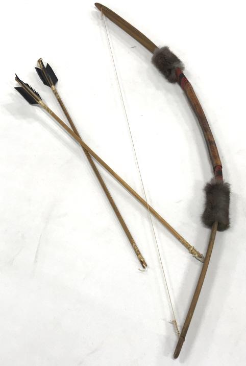 Antique Native American Beaded Bow & 2 Arrows: Antique traditional Native American beaded and leather wrapped carved wooden bow with 2 feathered arrows, decorative weapon. One arrow has carved stone arrowhead. Gray-brown tone fur details on bow. B