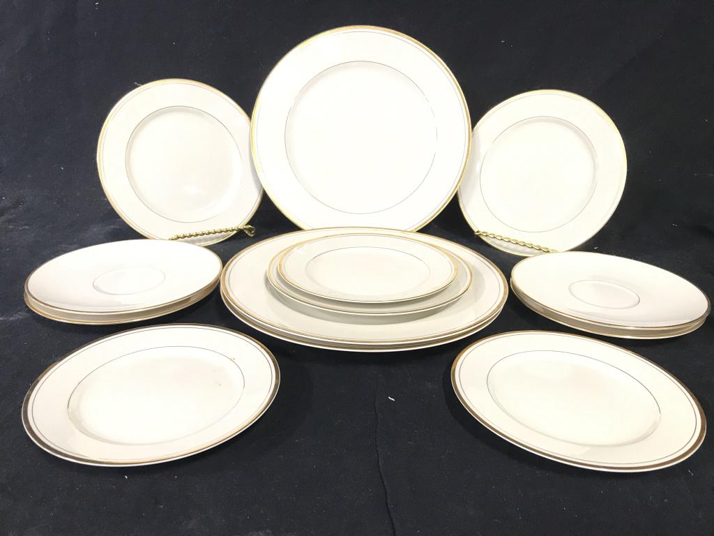 Lot 13 FITZ & FLOYD PALAIS Partial Porcelain Set: Lot includes 3 dinner plates, 4 Saucers, 3 salad plates, & 3 bread plates. Dinner plates measure approx 10 inches wide. Each have gold toned accent detail and are cream toned. dinner ware, tableware,