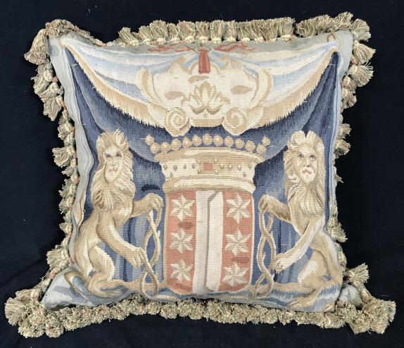 Antique Down Filled Aubusson Style Tapestry Pillow: Antique Down Filled Petit Point Aubusson Style Tapestry Pillow With velvet back and fringed edges, pillow depicts two lions on either side of a crest, measures approx 24 inches square, discoloration t