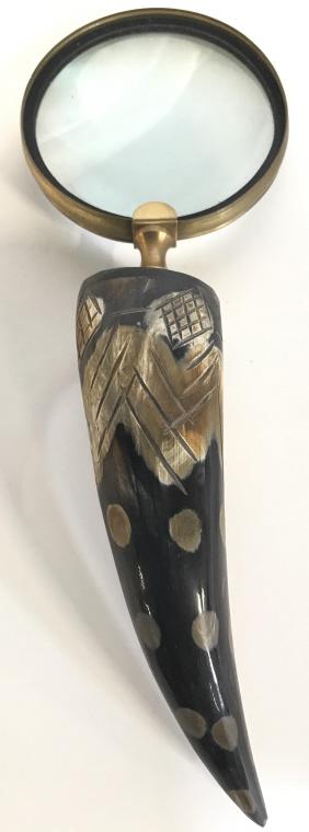 Carved Bone Handle Magnifying Glass: Magnifying glass has carved bone handle. Piece has gold toned brass border around glass. Piece measures approx 11.5 inches long 4 inches wide. office accessory, desktop accessory, collectible, 6