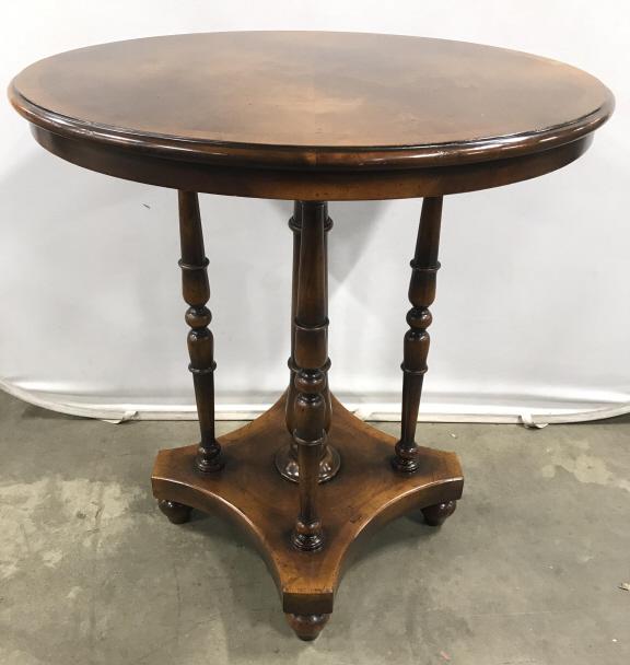 Carved Wooden Burled Wood Bar Table: Bar table is round. Contains carved wooden detail. Piece is light brown toned. Contains 4 carved wooden feet. Piece measures approximately 40 inches tall 36 inches wide. bar table, counter height tabl