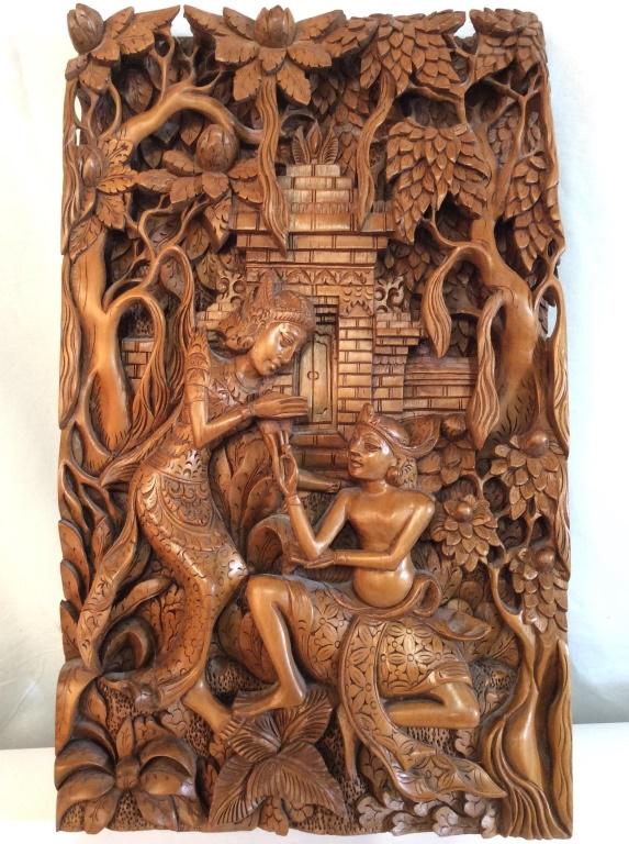Indonesian Wooden Relief Figural Carving: Piece contains intricately carved detail depicting 2 Figurals, leaves, trees, and architecture in background. Piece measures approx 17 inches tall 11 inches wide. home decor, Indonesian arts and craft