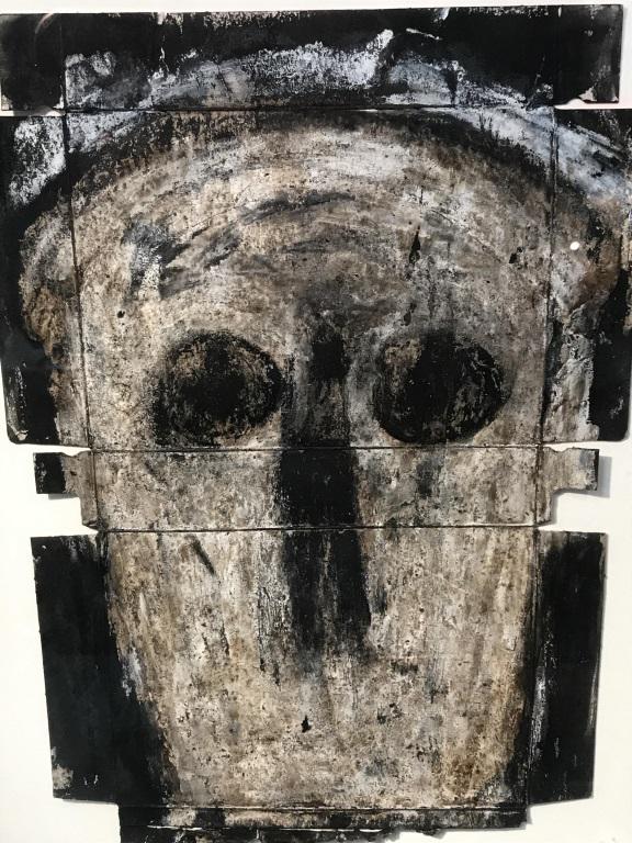 Verso Signed Art Brut Portrait on Frozen Meal Box: Signed illegibly on verso. Brut expressionist painting on frozen meal cardboard depicts portrait. Artwork is mounted and set behind plexiglass in wood frame. Signature on verso is visible due to matti