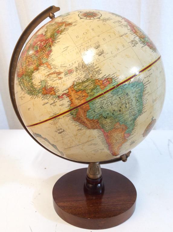 REPLOGLE WORLD CLASS SERIES GLOBE: Globe has cream Tone. Piece has circular wooden base. Piece measures approx 13 inches tall 9 inches wide. office accessory, globe, desk top globe 6