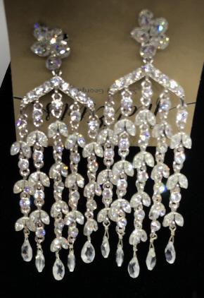 Rhinestone Chandelier Clip On Earrings: Long dangle clip ons, hang 2.5 in. 5 Strands connected to a rhinestone cluster. Designer Carolee. Comes in gift pouch, Chandelier Clip Ons, Tassel Style Earrings, Non Pierced Earrings, Bling Rhineston
