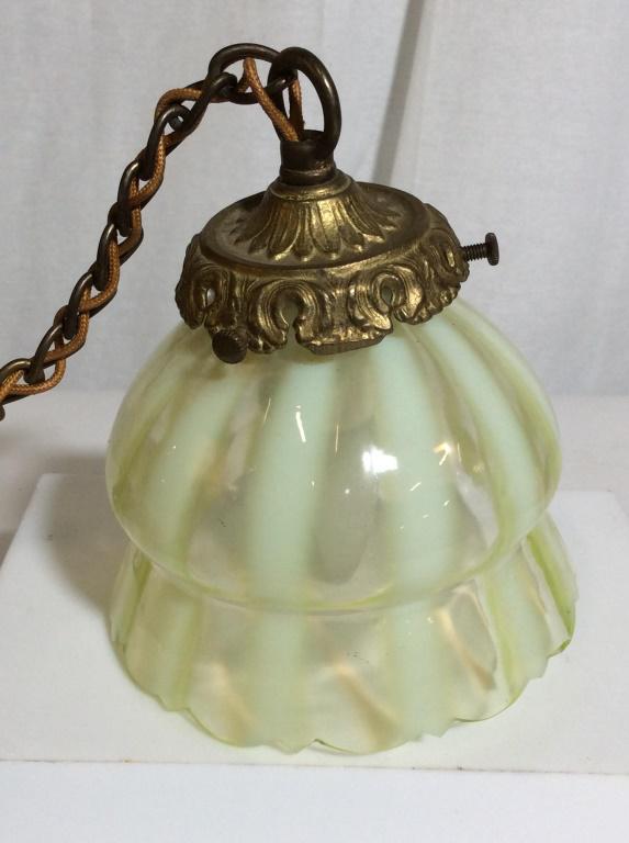 Vintage Hanging lamp fixture: Vintage, possibly antique, hanging lamp. The shades measure approx. 4.25 inches H, and have a diameter of 5 inches at its widest. Assembled the piece measures approx 60.5 inches in length. Vintage dec