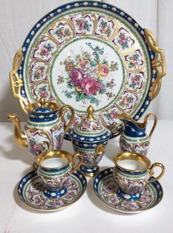 Vintage P. PASTAUD LIMOGES FRANCE Tea Set: Vintage, possibly antique, P.Pastaud Limoge Tea Set, 8 count set. The pieces are hand painted and decorated with gold embellishments. Signed by the artist, R. Bisson. The largest piece measures approx