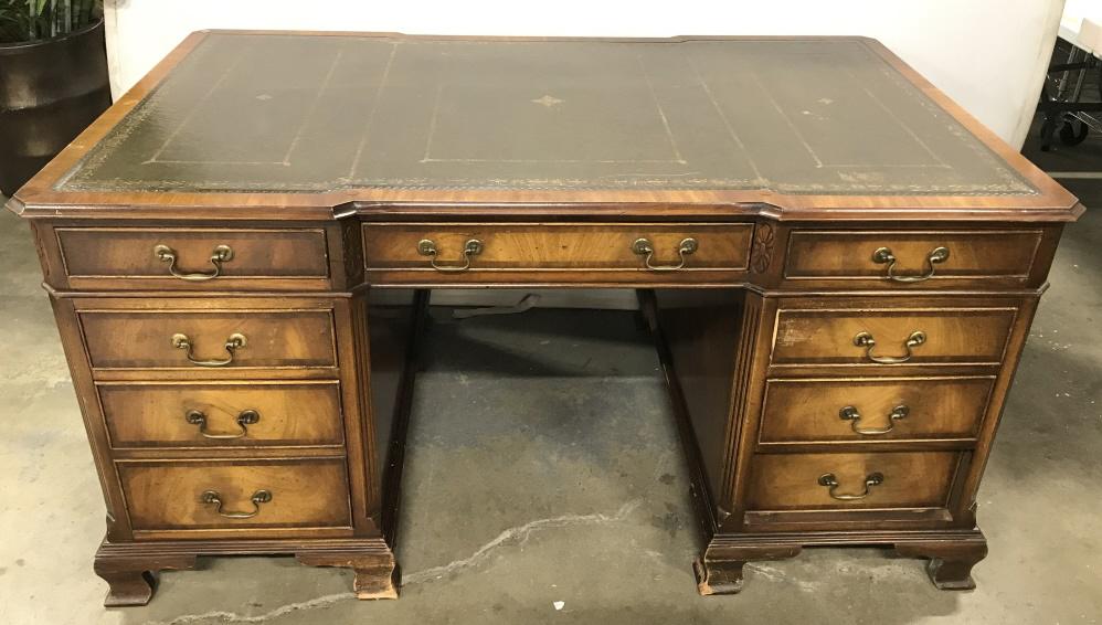 Georgian Style Mahogany Toned Partners Desk: Vintage possibly antique Georgian Style Mahogany Toned Partners Executive Desk, dark green leather top with embossed gold design, one center drawer flanked by four drawers on each side all with brass