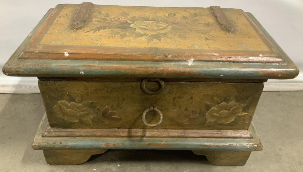 Antique Hand Painted Wooden Chest: Antique hand painted wooden chest, appears to be oak. Hinges and handles appear to be crafted from iron. The chest is decorated with floral paintings. Discoloration and wear is present due to age and 