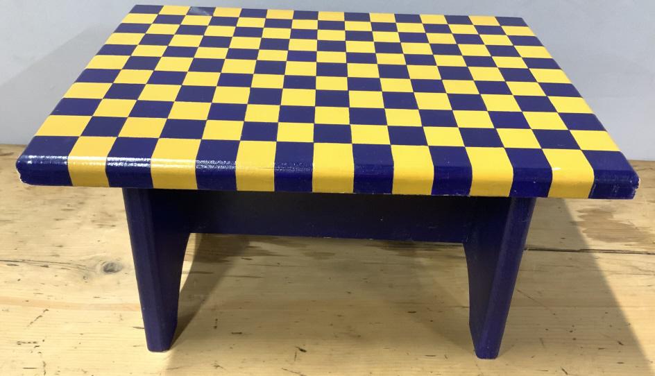 Wooden Checkerboard Foot Stool: Wooden checkerboard foot stool. Some wear on edges of Stool, resulting in some paint chipping. Piece measures approx 15.25 inches W, 8.5 inches tall, and 11.12 inches long. Home decor, footstool, otto