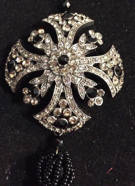 Beaded Art Nouveau Pendant Necklace, Carolee: Designer Carolee long beaded necklace. this rhinestone/crystal & beaded pendant with seed beaded tassels. Pendant resembles cross, measures 2.5 in. Sq. Tassel drapes 3.5 in. Length of necklace 40 in w