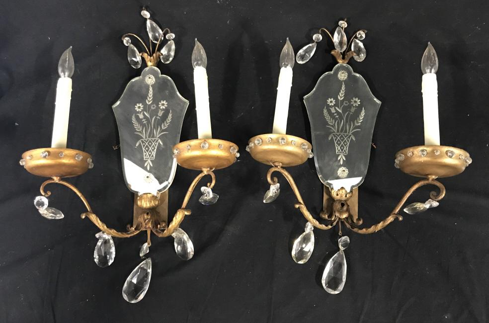 Pair Vintage Gilt Metal Etched Glass Wall Sconces: Pair Vintage Gilt Metal, Etched Mirrored Glass, and Crystal Prism Wall Sconces. Each Sconce Has Two Faux Candle lights, lights not tested, measures approximately 24 inches tall x 15 inches wide x 9 in