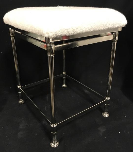 Chrome Toned Metal Vanity Stool: Chrome Toned Metal Bath Stool with white terry cloth cushioned seat, measures approximately 19 inches tall x 15.5 inches long x 14.5 inches wide. Stool, Bathroom Stool, Vanity Stool, Metal Base Stool.