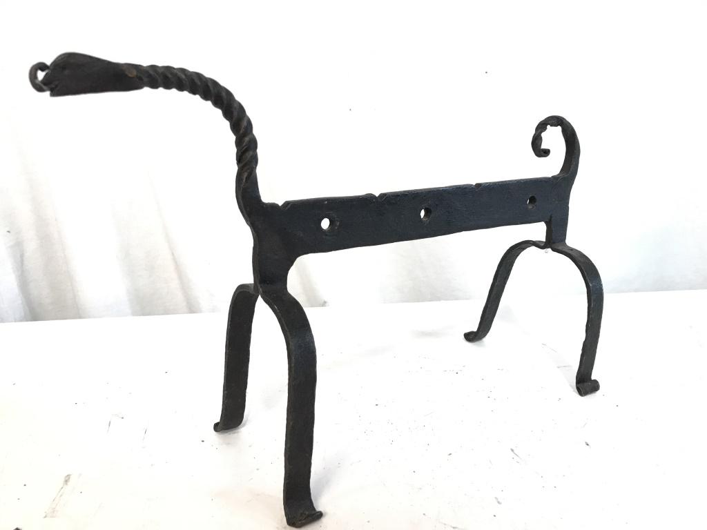 Primitive Animal-Form Iron Boot Scraper: Vintage, possibly antique, primitive animal-form iron metal boot scraper. Measures approx 9.5 inches in height by 14.5 inches in width. Surface wear, imperfections consistent with age. Collectible boo