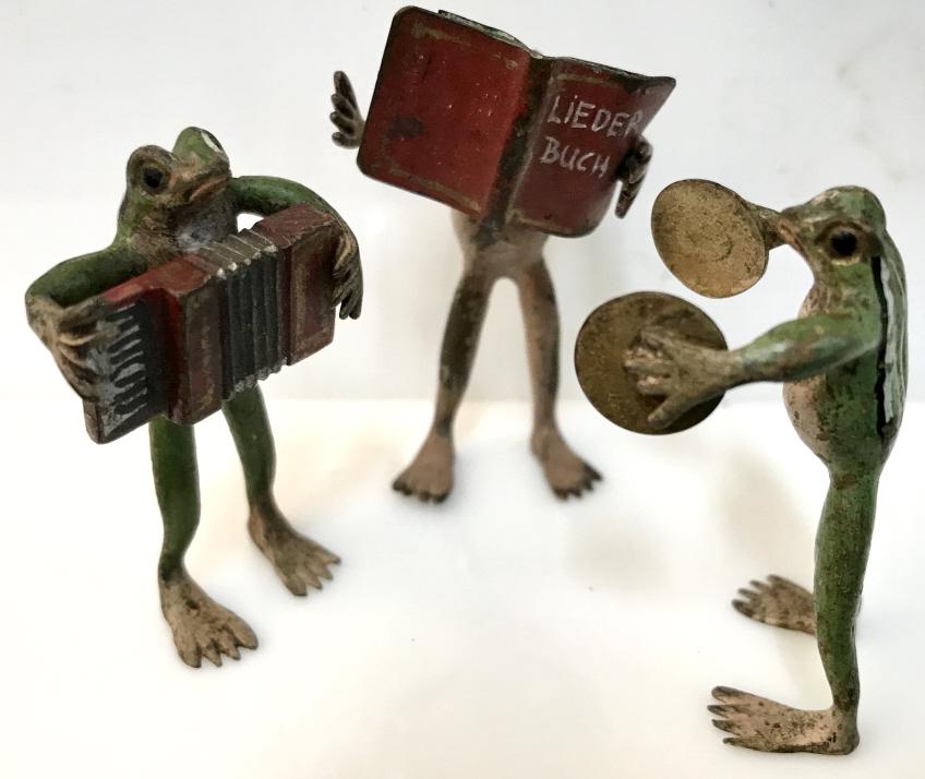 Lot 3 Antique Vienna Bronze Miniature Frogs: Lot 3 antique Cold-Painted Vienna Bronze miniature frogs, c. 1910, anthropomorphic and whimsical in style. Frogs make up a musical band, each frog playing various instruments, one singing from the Lie