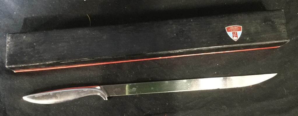 Vintage GERBER EXCALIBUR Carving knife: Vintage gerber excalibur carving knife. Measures approximately 16.5 inches long. Comes in original box. Blade is approximately 11.5 inches long. Knife, knives, Excalibur, gerber, gerber knife, carving