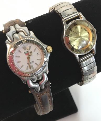 Lot 2 Wristwatches, Tag Heuer, Charles Raymond: Signed Designer wristwatches. Leather band Swiss Tag Heuer watch in silver tone stainless steel, water resistant at 200 m. Needs band replacement. Watch face & hardware measure 2 by 1 in. Vintage Stre