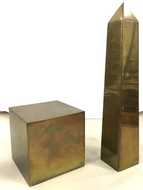 Lot 2 Brass Toned Metal Obelisk And Cube: Lot 2 Brass Toned Metal Obelisk And Cube Tabletop Sculptures, each marked illegibly on underside, Obelisk measures approx 14.5 inches tall x 2.5 inches in square, cube measures approximately 5. 25 inc