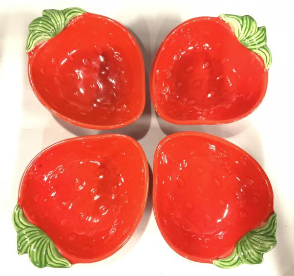 Set 4 Porcelain Strawberry Dishes: Lot includes 4 dishes. Each have green & red tones with strawberry shape. Piece measures approx 6.5 inches long 5 inches wide. dishes, serving dishes, serving vessels, summer dish set 6