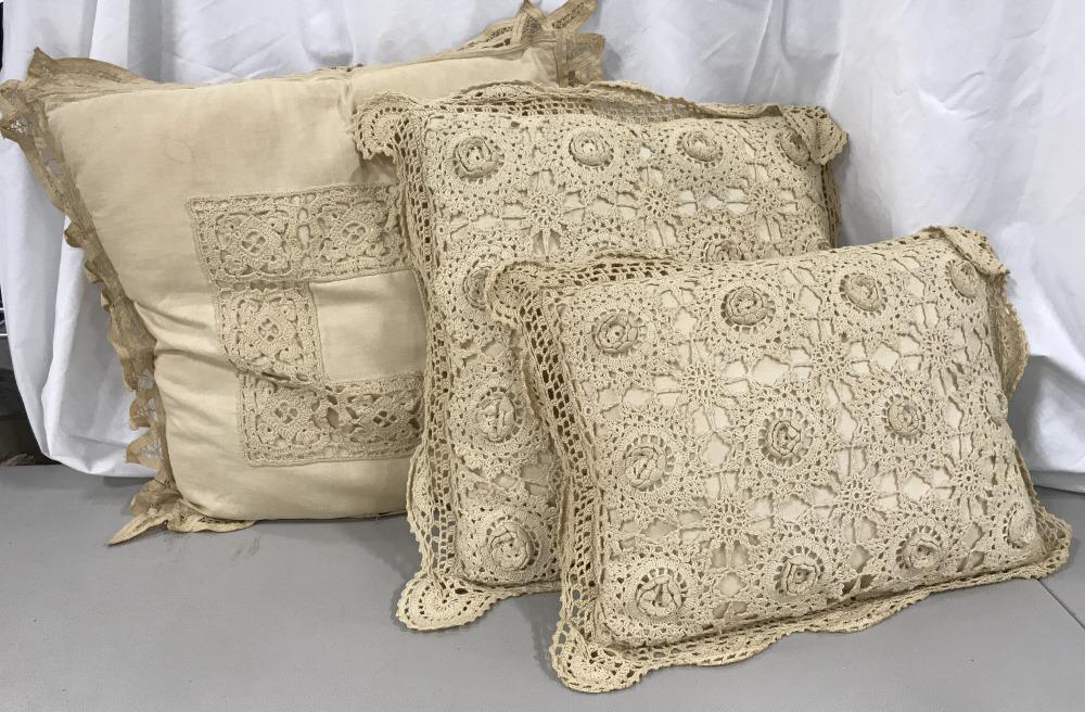 Lot 3 Vintage Pillows W Crochet Floral Design: Lot 3 Vintage Pillows W Crochet Floral Design over linen base, some mark to material and discoloration due to age and use, largest pillow measures approximately 17 inches square. Vintage Pillows, Croc