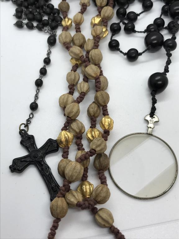 Lot 3-Rosary Beads, Fashion Beaded Long Necklaces: Black rosary beads, cross hangs 4 in. Cross measures 2 by 1 1/4 in. Long over the head beaded necklaces. Two sized black composite beads knotted on string. Beads are 8 mm & 15 mm. Necklace has a long 