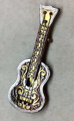 Chanel guitar sale brooch