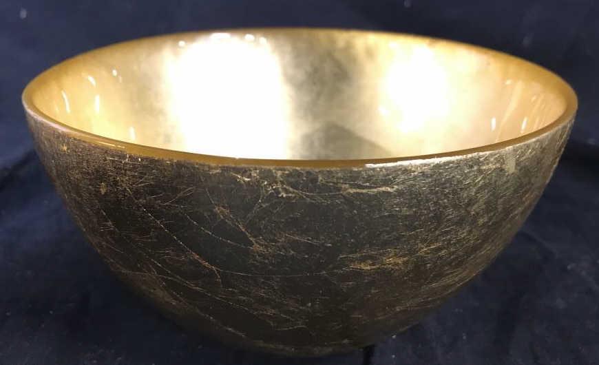 Gold Toned Glass ANTHROPOLOGIE Bowl: Bowl is gold toned and glass. Underside of piece is marked ANTHROPOLOGIE. PIECE measures approx 6 inches wide 3.5 inches tall, gold leaf style, designer tableware, trinket dish, collectible, shelf pie
