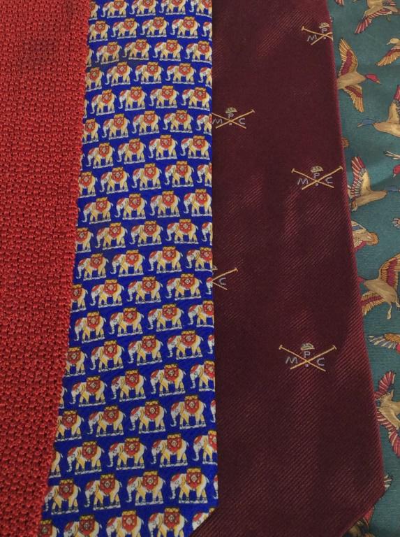 Lot 4 Mens Neckties: Lot of 4 men’s neckties, patterns and manufacturers vary by tie. Manufacturers include PAUL STEWART, and SALVATORE FERRAGAMO. The longest tie measures approx 58.75 inches in length. Some wear is pre