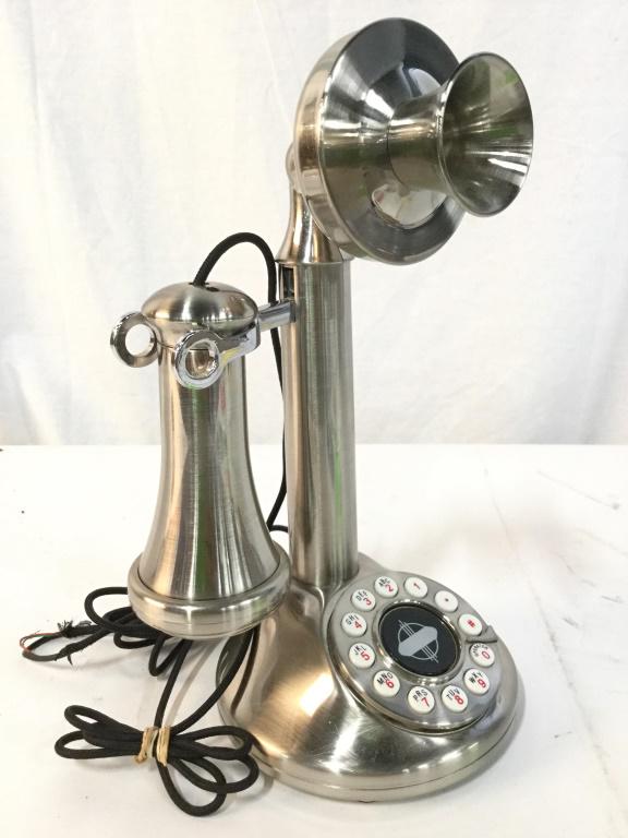 CROSLEY Silver Toned Phone: Phone appears to be metal. Phone has circular dial pad & earpiece on string wire. Piece measures approx 11.5 inches tall 7 inches wide. vintage collectible, decor, 6