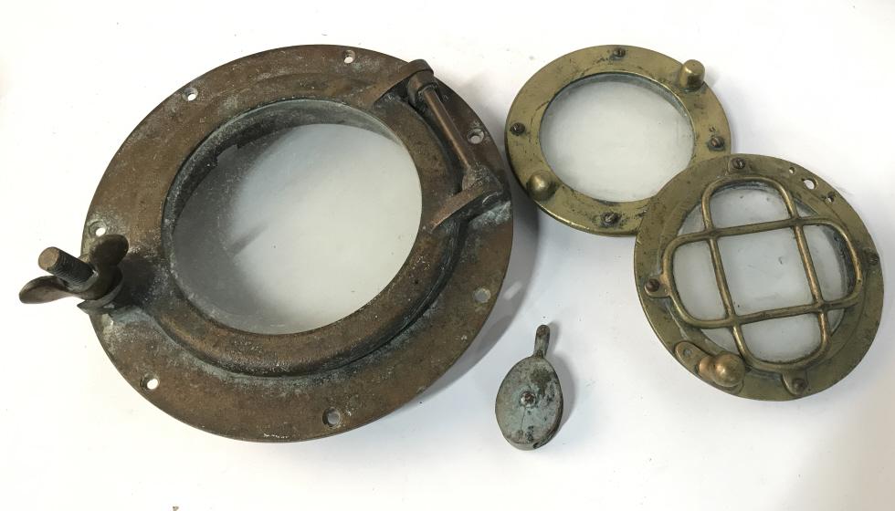 Set 4 Vintage Metal Port Hole Windows And Pulley: Set 4 Vintage Possibly Antique Brass Toned Metal Port Hole Windows And Pulley, shows signs of wear and pitting due to age and use, largest measures approximately 10 inches in diameter x 4.5 inches to