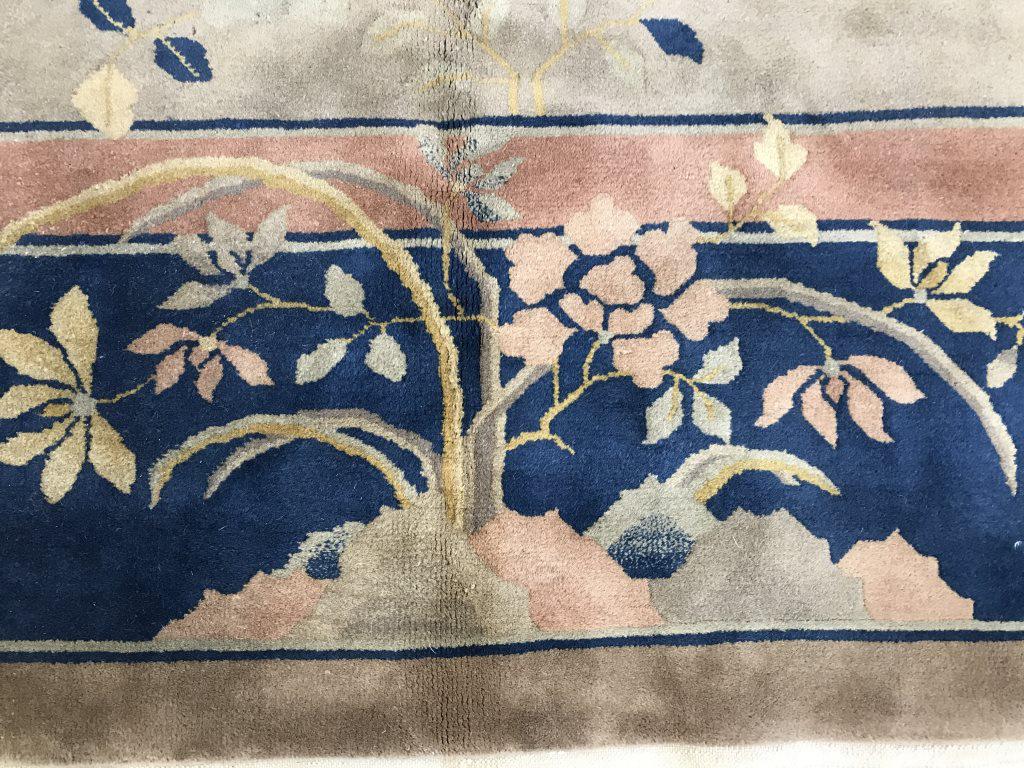 Chinese Art Deco Handmade Wool Rug: Rug is wool & handmade. Piece contains multi toned floral & leaf detail. Measures approx. 136 inches long 104 inches wide. Rug , wool rug, area rug, Chinese rug, Asian rug, Orientalism, orientalia. as