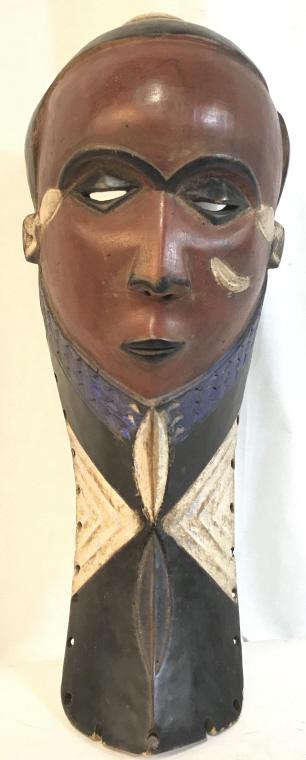 African Art Pende Carved Wooden Dancing Mask: African Art Pende carved wooden dancing mask from Zaire, Congo. Mask is painted with red, blue, and black oil paint, along with areas painted with caolin. Mask measures approximately 18.25 inches in h