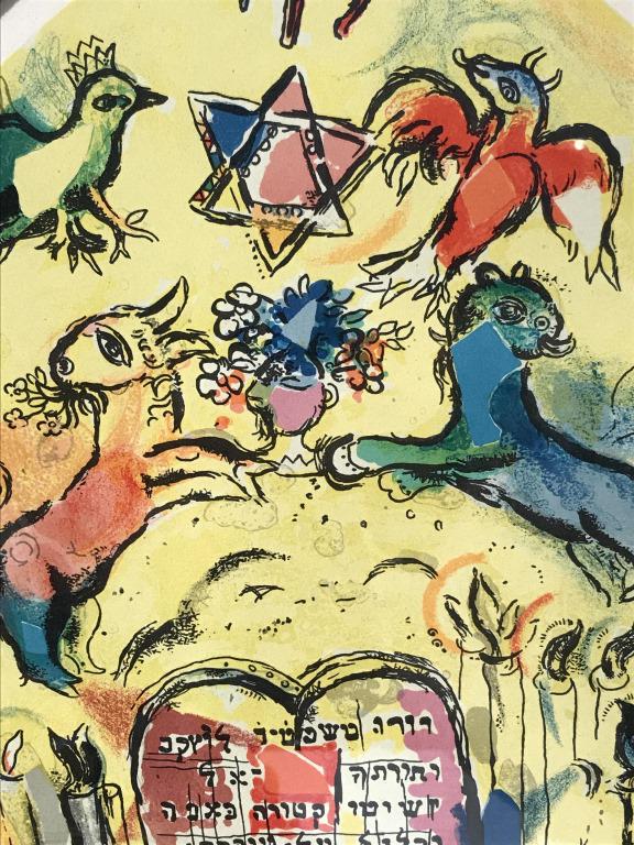 Pair Lithographs, Chagall’s Vitraux pour Jerusalem: Pair of lithographs depicting Marc Chagall’s ‘Vitraux pour Jerusalem,’ including ‘Tribe of Naphtali’ and ‘Tribe of Levi.’ Lithographs are matted with velvet and set behind glass in gold 