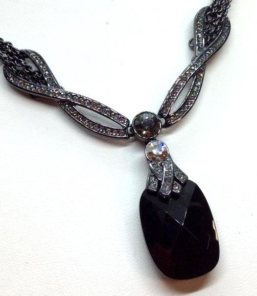 GIVENCHY Victorian Gothic Pendant Necklace: End Tassel marked for GIVENCHY. Black tone metal chain with faceted black bead pendant and rhinestone details. Measures approx 17 inches in length fully extended. Designer jewelry, Statement jewelry,