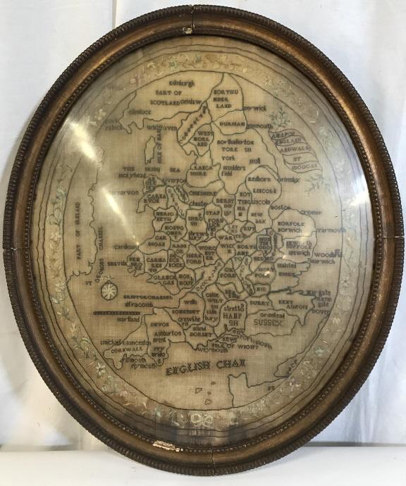 Antique Sampler Embroidery Of England By Dougal: Sampler embroidery is vintage possibly antique. Piece is professionally framed in gold toned oval shaped frame. Piece depicts England and Wales. Piece measures approx 25 inches tall 21.5 inches wide. 