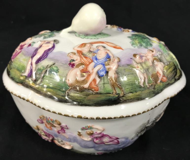 Vintage Capodimonte Porcelain Lidded Dish: Vintage Hand Painted Capodimonte Porcelain Ceramic Lidded Dish with pear handle, depicting cherubs, horses, and disrobed people frolicking outdoors and in the clouds, measures approximately 6.25 inche