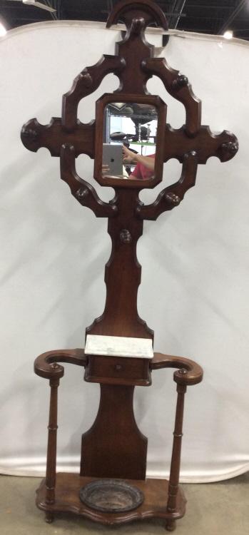 Antique Wood Marble Iron Hall Stand: Umbrella stand is antique. Piece contains mirror, 8 hanging dowels, 1 Petite sized drawer, white toned marble on top of drawer, Piece appears to have hand carved elements. Property of a New Fairfield 