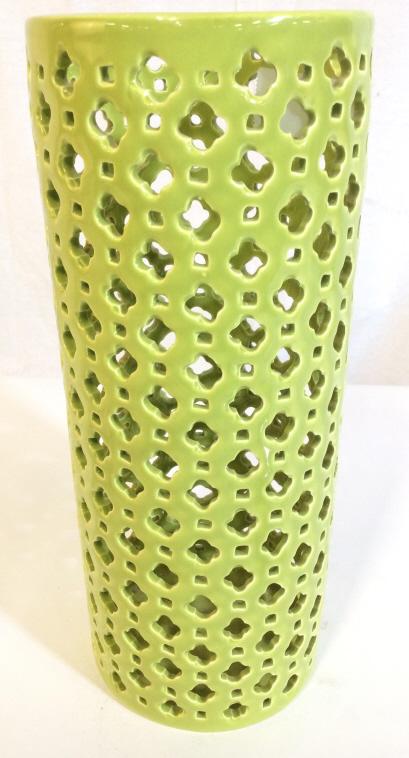 Green Toned Pierced Porcelain Vase: Vase is green toned & porcelain. Piece has pierced pattern detail. Vase is cylindrical shaped. Measures capprox 12.5 inches tall 5 inches wide. arts and crafts, decorative accessories, tableware 6