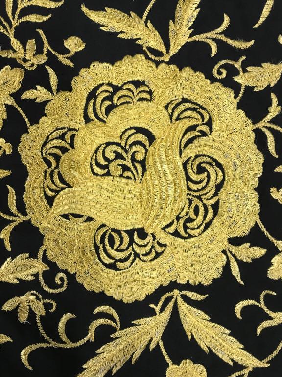 Vintage Floral Embroidered Silk Shawl: Vintage Piano Hand Embroidered Black Silk Shawl With Vibrantly Colored Yellow Floral Motif & crocheted Border toned thread and long tassels flow from crochet destabilize. Cloth measures app 48.5 x 49 