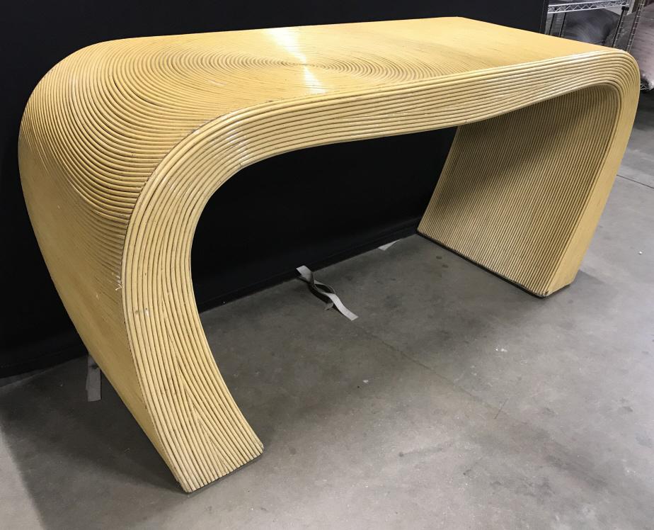 GABRIELLA CRESPI Style Curved Rattan Console: Console is vintage Circa 1970Â’s. Console is tan toned. Property of Southampton New York Estate. Piece measures approx 26 inches 53 inches long 19 inches deep. Console table, sofa table, sideboard,
