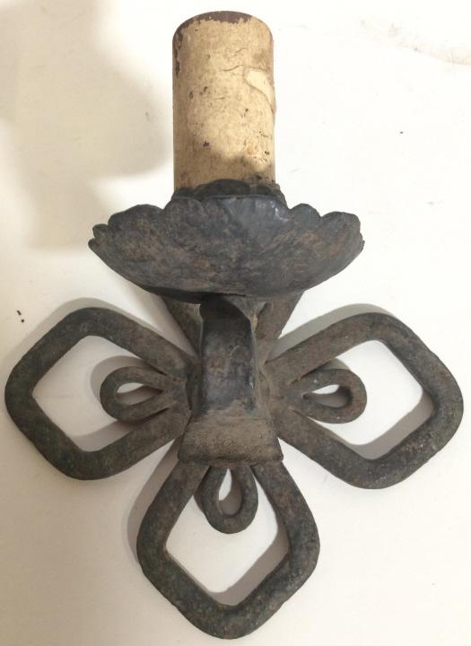 Pair Vintage Iron Metal Wall Sconces: Wall Sconces are black toned and metal, appear to be iron. Each measures approx 9 inches tall and wide 6 inches deep. Pieces have evident wear. home accent, home accessory, wall hanging, wall accent c